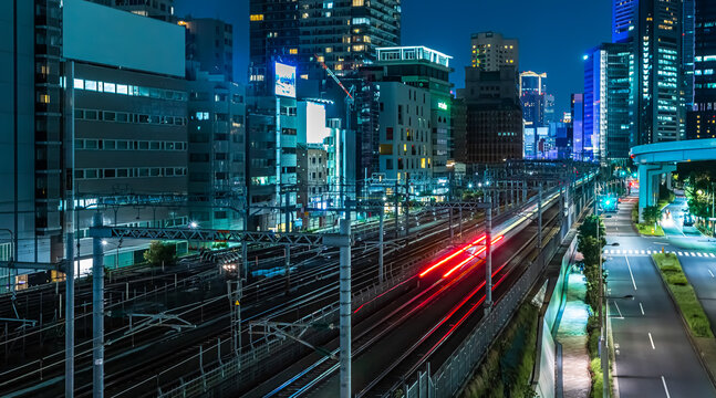 Red Train Light Trail Along Hamamatsucho Railway Tracks