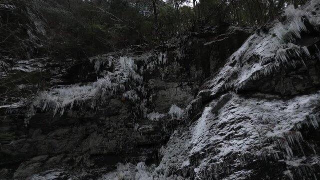 Countless Icicles at Otaki Waterfall, Mount Tebako, Kochi, Japan &ndash; Drone Aerial Footage of a Frozen Winter Landscape