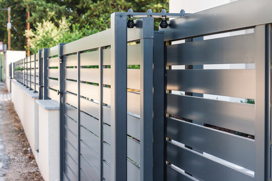 Modern fence with aluminum or metal shutter
