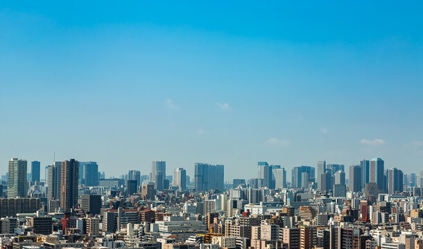 Hazy Tokyo Skyline Across Sumida on a Summer Day