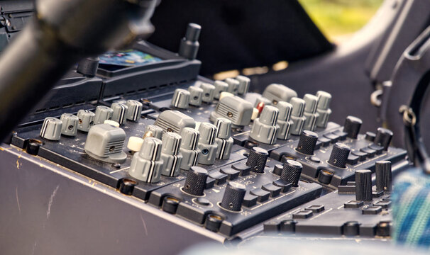 Aircraft cockpit controls and instrument panel showing aviation technology and flight engineering