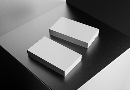 Two business card stacks on black display. 3d rendering