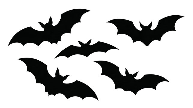 Black silhouette shapes of flying bats in various poses