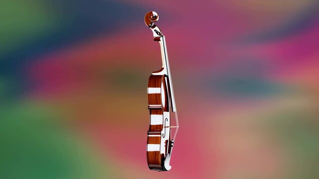 Polished wooden violin rotates slowly from frontal view toward narrow side profile, showing curved body, strings, fingerboard, chin rest, and scroll against softly blurred multicolor background
