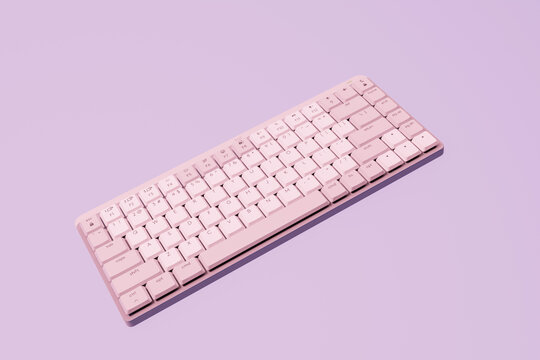 Wireless computer keyboard on a minimalistic pink background