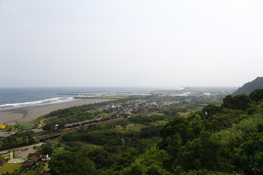 A scenic high angle view of the coastal plain and ocean.