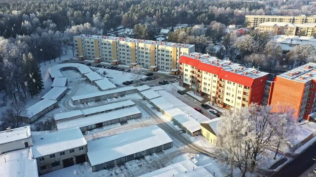 Aerial view of a residential district with soviet-era buildings during a cold winter day