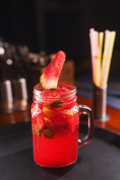 Refreshing and colorful healthy cool drinks served with fresh lemon slices and watermelon garnish. A vibrant summer beverage concept representing freshness, hydration, natural ingredients, healthy lif