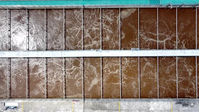 Aerial view of wastewater treatment pool aeration and mixing process