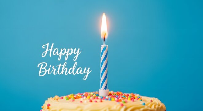 A single burning candle on a decorated cake against a blue background with the elegant text happy birthday written in a stylish white cursive font