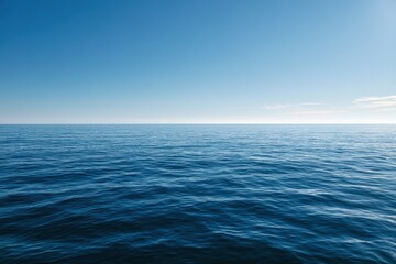 Fototapeta premium Horizon over calm blue ocean beneath a clear sky