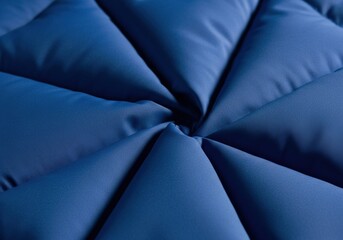 Obraz premium Abstract dark blue quilted fabric texture with geometric pattern.