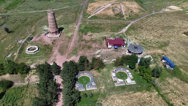 Aerial view of Burana tower complex with stone garden (balbals) in Kyrgyzstan.