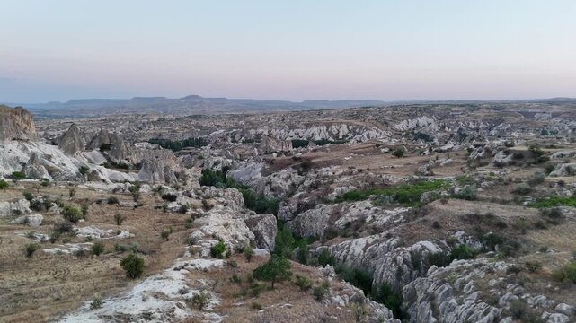 Tuff rocks volcanic valley with large gorge near Urgup in Cappadocia, Turkey.