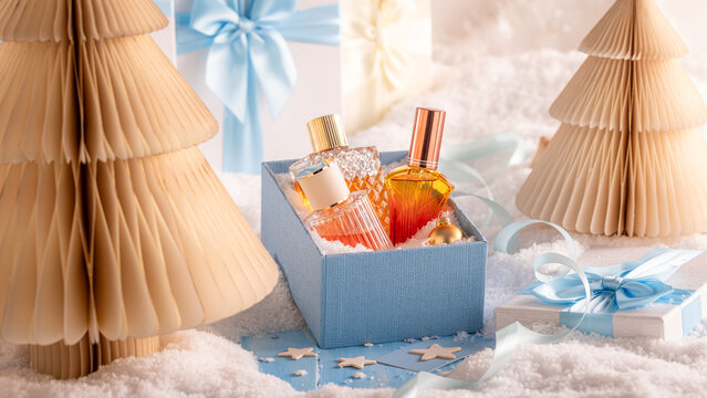 Special perfume is displayed outside right in the Christmas snow.
