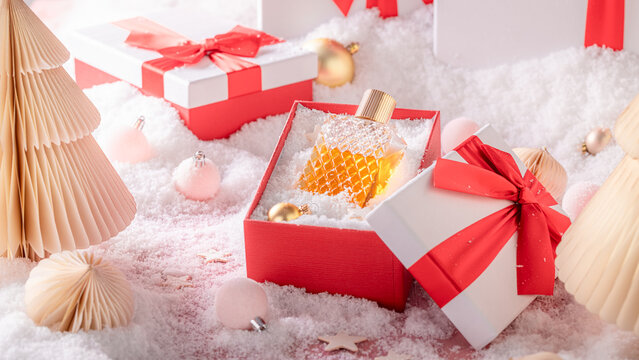 Wonderful perfume is shown in freezing cold Christmas outdoor setting.