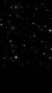 Elegant magical white starburst particles floating in dark night sky seamless vertical motion loop 4k video