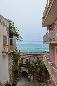 Scenic narrow street with sea view in Pizzo Calabria Italy