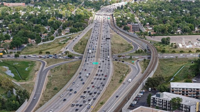 Aerial view of a busy multi-lane highway interchange in Denver, Colorado, United States.