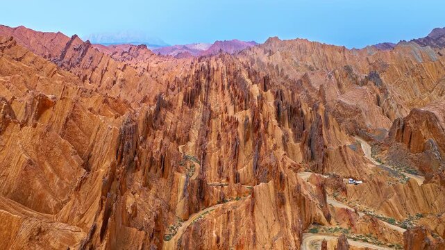 Aerial view of dramatic eroded sandstone peaks and ridges in the Red Mountain Stone Forest, Kuqa, Xinjiang, China