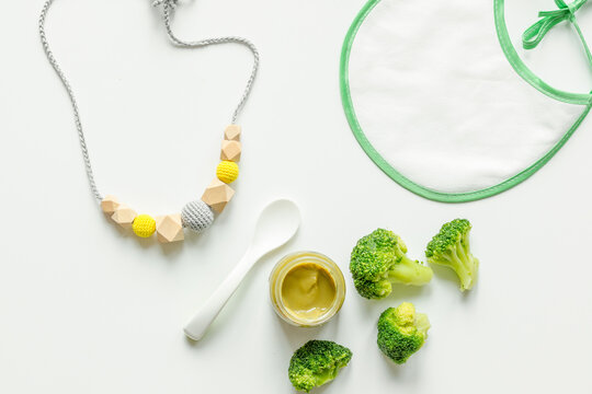 cooking vegetable puree for baby on white background top view