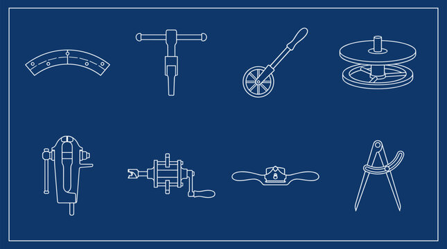 Collection of vintage woodworking tools and measuring instruments on blue background