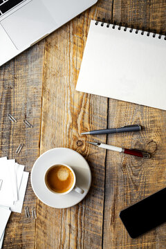Man's working place at wooden table - nobody