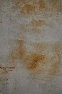 Old scratched white metal texture with heavy rust patches background
