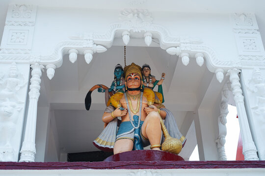 Statue of Lord Hanuman carrying Lord Ram and Laxman on their shoulder depicting the story epic of Ramayana that how Hanuman ji serves his beloved Lord Ram and family.