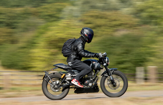 Milton Keynes; UK - Sept. 6th 2026: Man riding a  FB Mondial HPS motorcycle driving on a British road