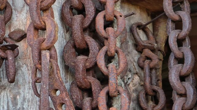 Rusty old chains in a blacksmith's workshop 