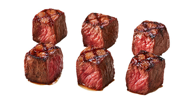 Grilled beef steak cubes with charred sear marks