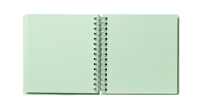 Open spiral bound notebook with light green blank pages