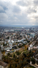 Drone aerial vertical shot of medieval St Alban Tor city gate and urban cityscape in Basel, Switzerland © Cirrus Height