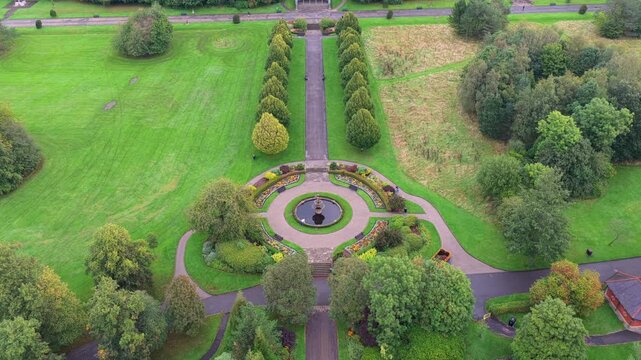 Aerial video of Alexandra Park Ornamental Fountain Promenade and Play Area in Oldham, Greater Manchester. 