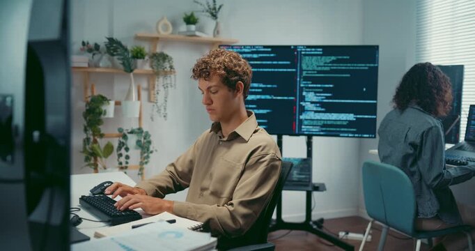 Group Adult male, female freelance typing write prompt AI bot IT app smart program nomad, video game, terminal with coding language, user interface, designer, big data center on desktop computer.