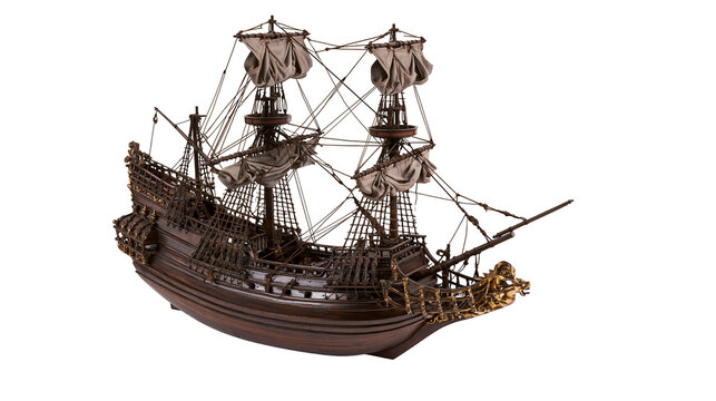 Detailed wooden model of a vintage galleon ship with masts and rigging
