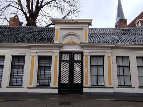 Historische Wandmalerei an einer Hausfassade in Groningen
