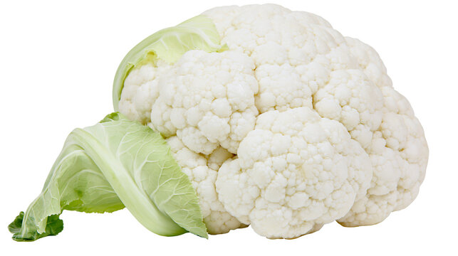 Fresh whole cauliflower head with green leaves