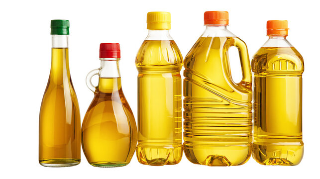 Five assorted glass and plastic bottles filled with golden vegetable cooking oil