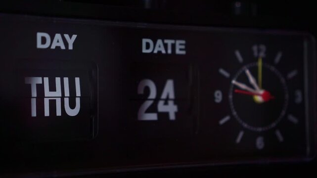retro flip clock with day and date display, analog hands ticking, dark room vintage timepiece concept.