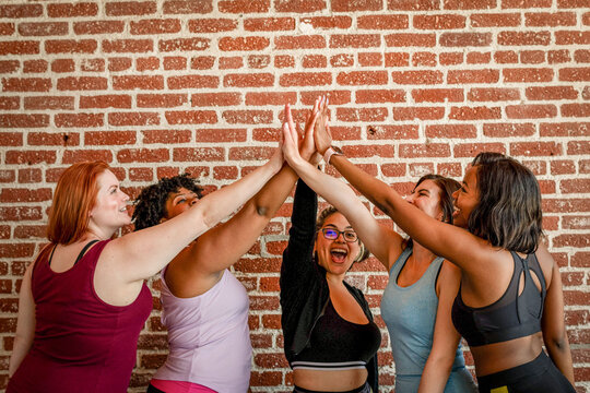 Diverse women celebrating unity together