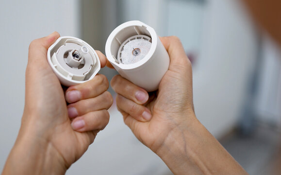 Woman Unpacking New Continuous Glucose Monitor Sensor Applicator
