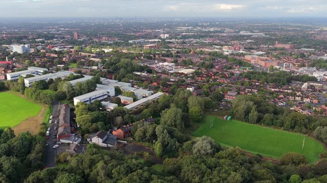 Aerial Video of Oldham Edge Playing Fields Residential Enclave and Distant Manchester Skyline