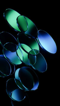 Glass discs cluster with luminous teal premium reflections.