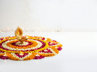 Fototapeta premium Colorful rangoli design with diya lamp