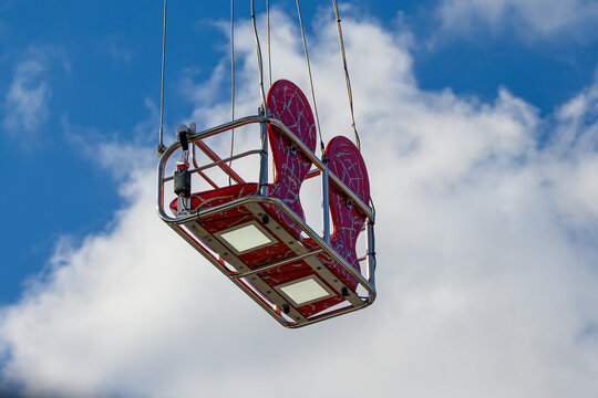 Ferris Wheel Ride in captured interacting naturally in an outdoor setting, in a clean visual environment, under daylight, with a natural mood, suitable for travel, outdoor, and lifestyle campaigns.