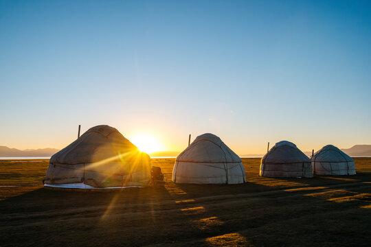 The yurts of nomads at sunset