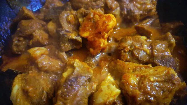 Slow motion close up video of mutton kosha.