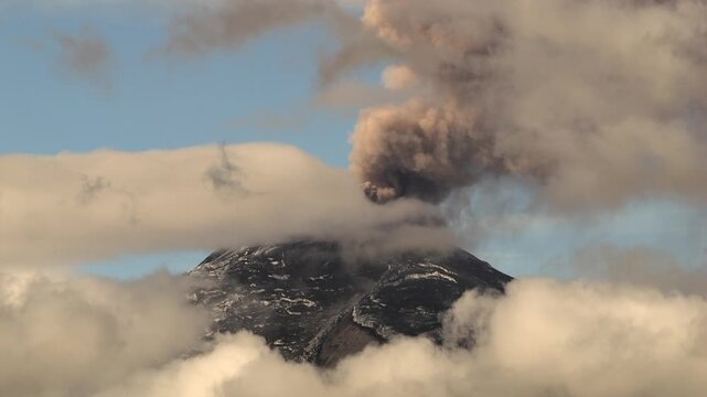 Cotopaxi Volcano, Ecuador, erupting, 12th of May 2023,. Volcanic ash is erupting from the crater. At 5897m altitude one of the world's highest active volcanoes.